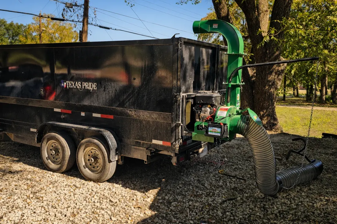 Brothers Lawn and Tree Service dump trailer and leaf vacuum used for leaf and brush haul-off.